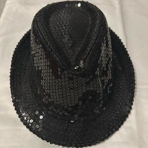 Black sequin hat; no tag size or brand. In like new condition